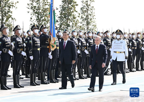 习近平同乌兹别克斯坦总统米尔济约耶夫会谈3.jpg