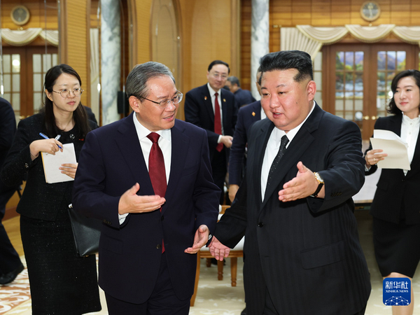 李强会见朝鲜劳动党总书记、国务委员长金正恩_缩小大小.jpg